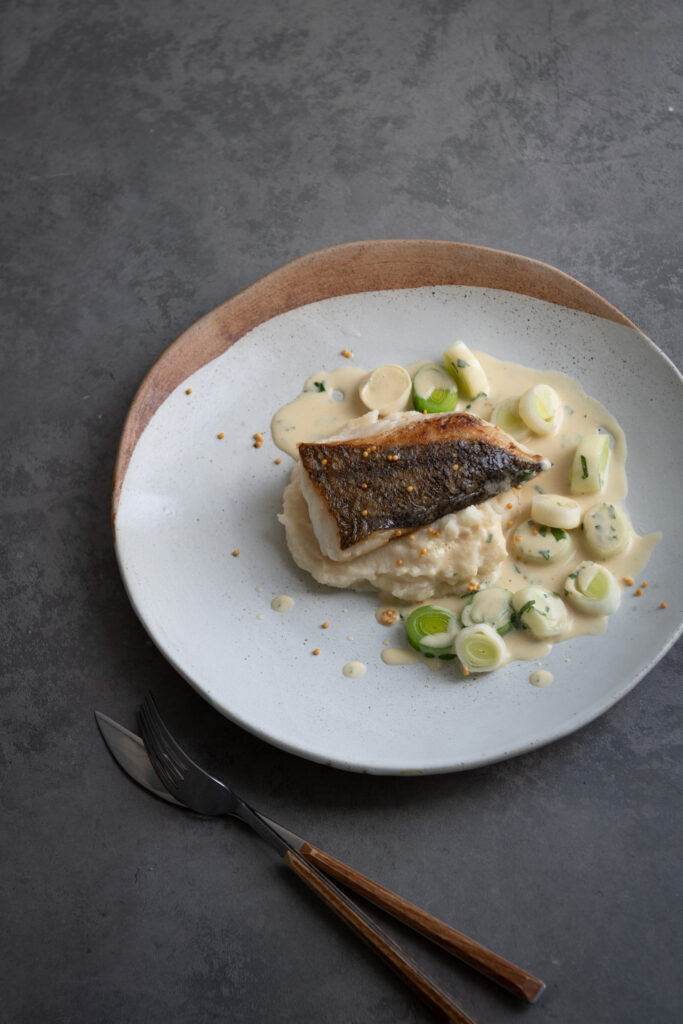 Hake, Celeriac Puree, Mustard Leek Sauce